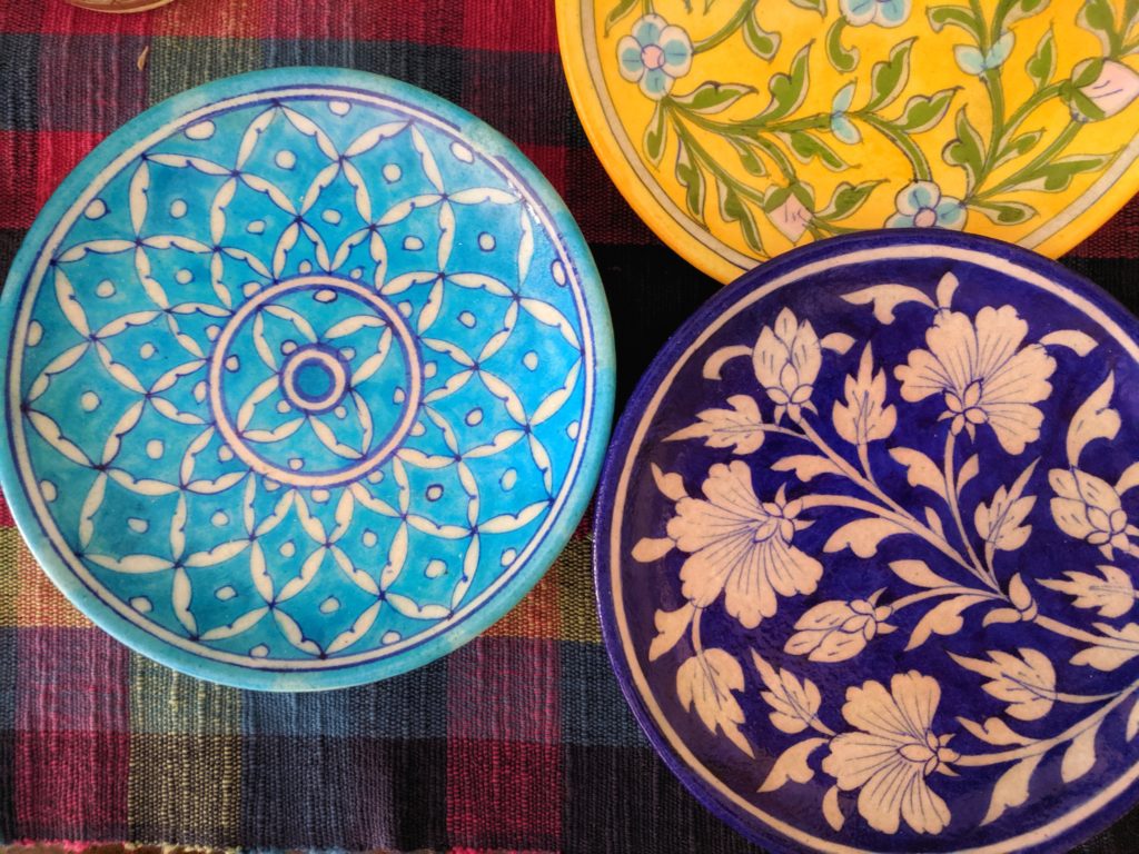 Blue pottery plates from Neerja International 